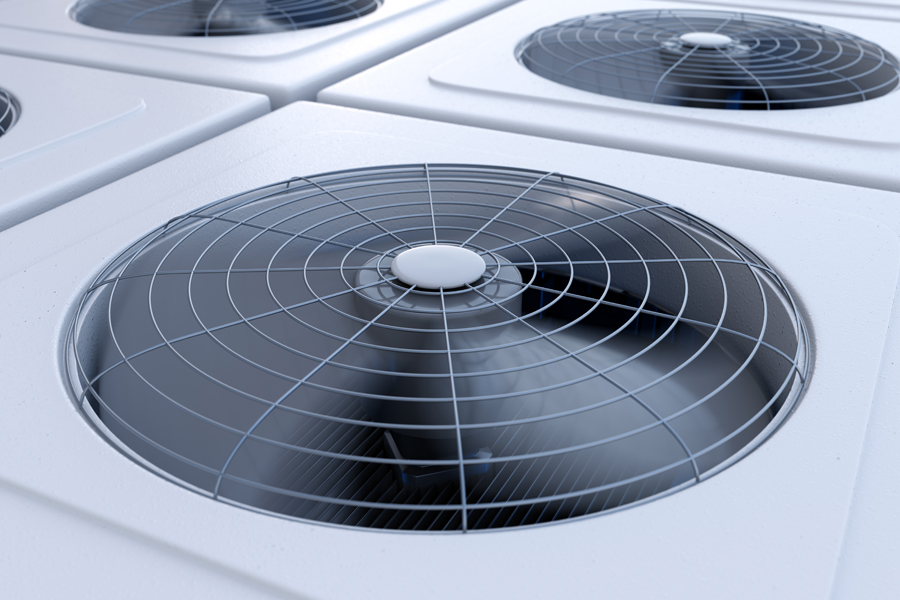 Close up image of HVAC system units with fans.