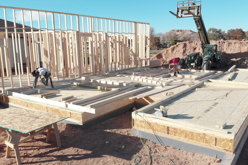Video - HVAC Equipment for Your New Home. Image shows foundation of new home being built outside.